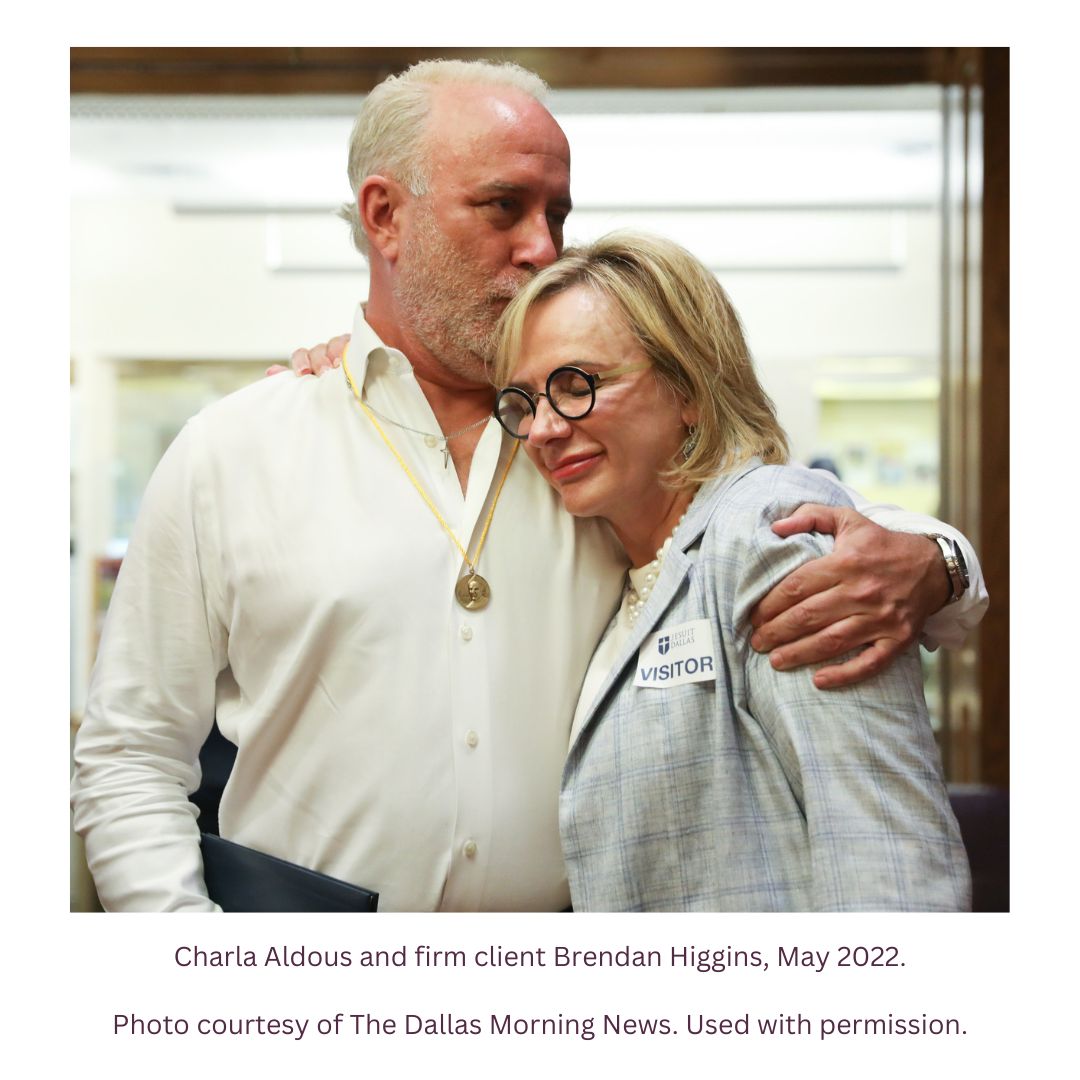 Charla Aldous and firm client Brendan Higgins, May 2022