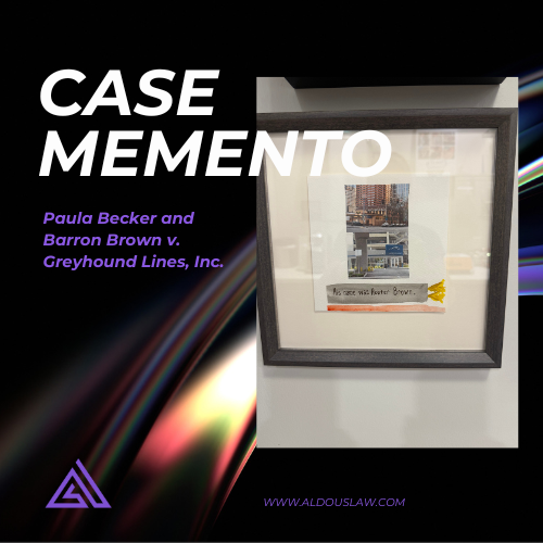 Framed photo of greyhound station with "His name was Hunter Brown" written below it.